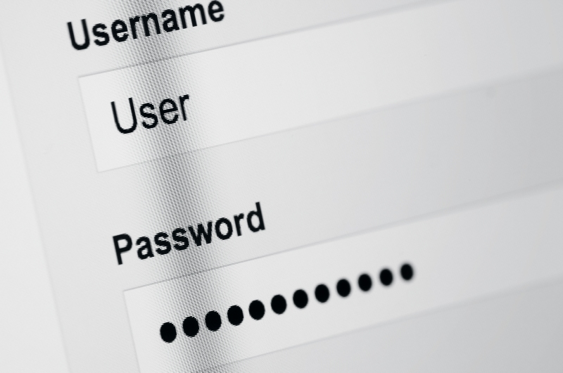 Computer login screen showing username and password fields, representing password manager for aging parents